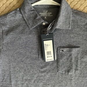 New with tags.  Looks gray in picture, but it is navy blue.